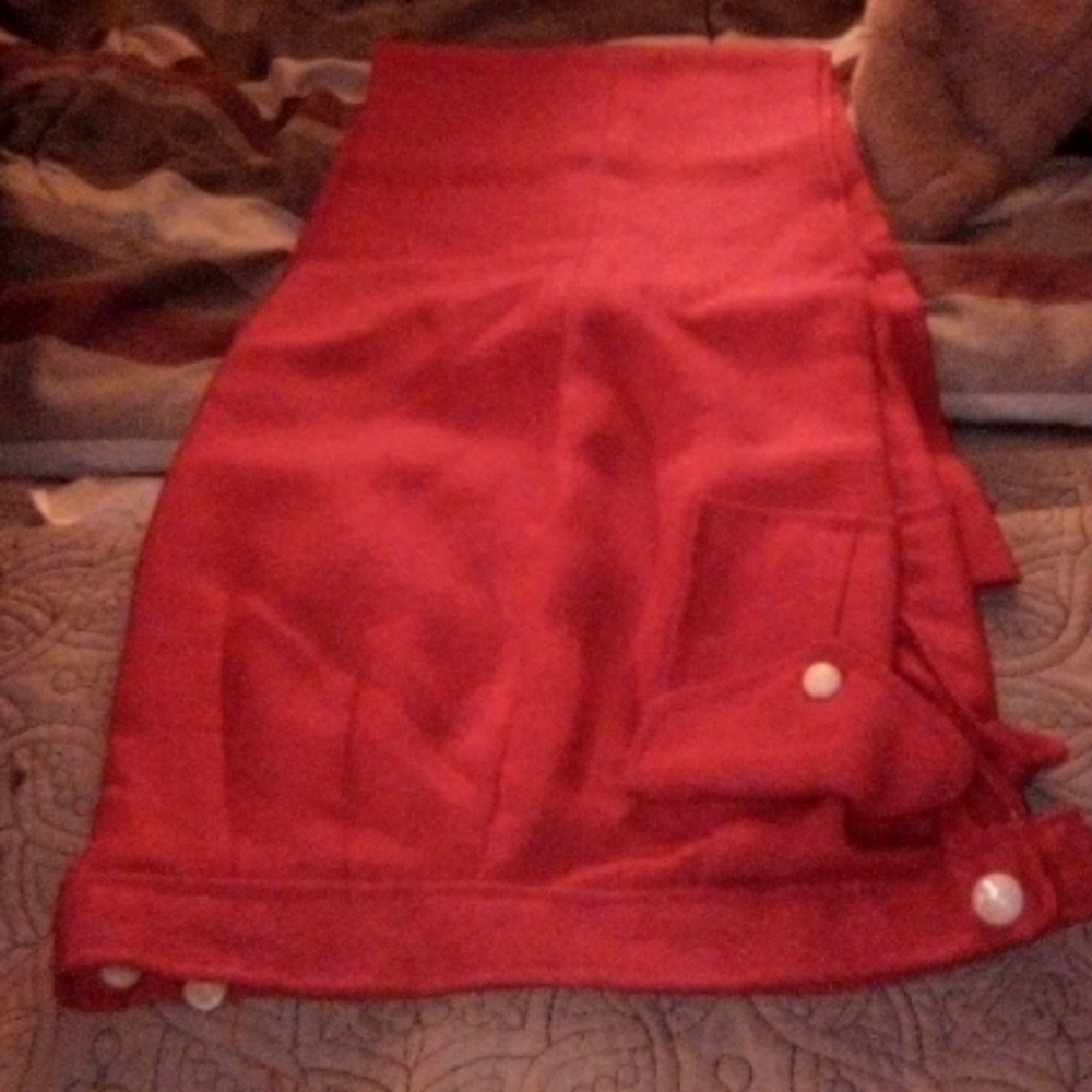 Red bell-bottom slacks, size 6, w/ very thin fabric